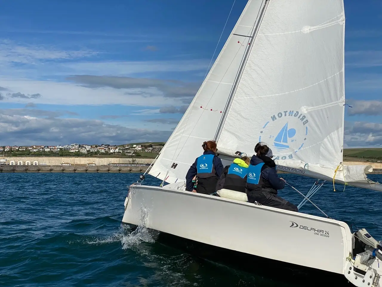 Children learning to sail